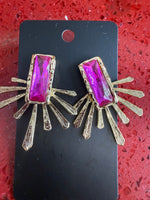 Colorful earrings featuring gold-plated decorative motifs: Pink