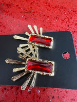 Colorful earrings featuring gold-plated decorative motifs: Red